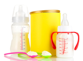 Bottle with milk and food for babies isolated on white