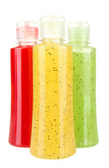 Bottles with scrub isolated on white