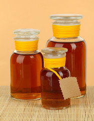 Medicine bottles on beige background