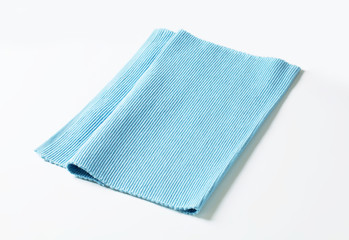 Fototapeta na wymiar Blue cotton place mat