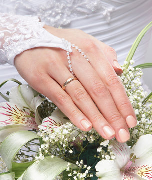 Fresh and beautiful wedding bouquet in bride's hands