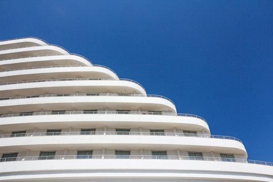 White building cascading down