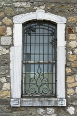 Fototapeta na wymiar Window in Stone Building