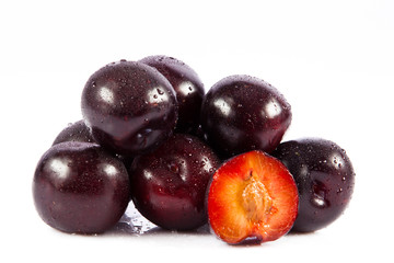 plums isolated on white background
