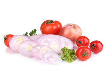 Onion cut with rings on wooden board isolated on white