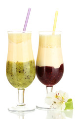 Delicious fruit smoothies isolated on white
