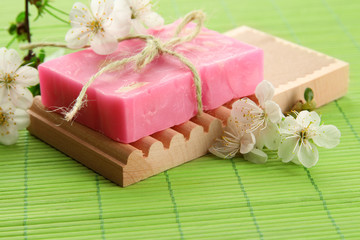 Fototapeta na wymiar Natural handmade soap on bamboo mat