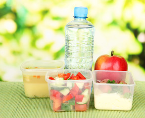 Tasty lunch in plastic containers,