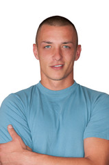 Fototapeta premium Junger Mann mit verschränkten Armen