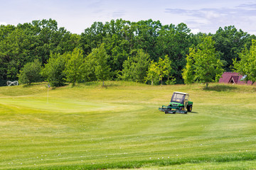 Perfect wavy ground with green grass on a golf field