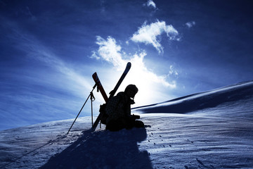 skiers silhouette - 53058823