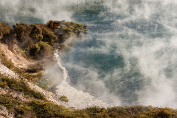 steam raising from thermal lake in Waimangu