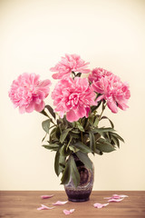 Flowers bouquet in vase vintage style photo