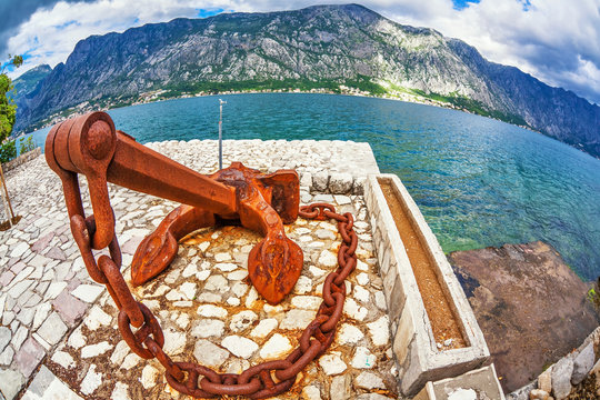 Fototapeta Old anchor on the waterfront