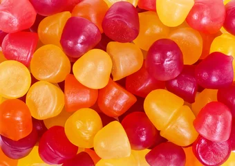 Gordijnen Closeup of fruit candy gummies in different colors © leekris