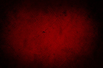 Obraz premium Red textured concrete wall background. Dark edges
