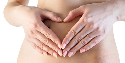 woman heart shape  hands belly