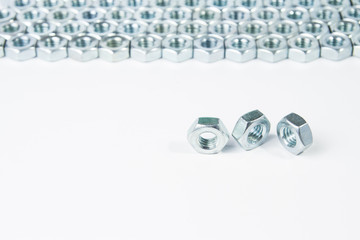 chrome three nuts solated on white background