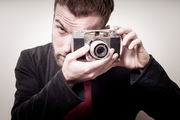Fototapeta premium hipster stylish fashion man with old camera