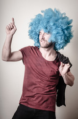 hipster stylish funny man with blue wig