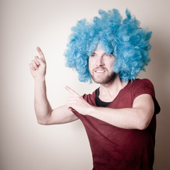 hipster stylish funny man with blue wig