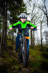 Naklejka premium Boy cycling