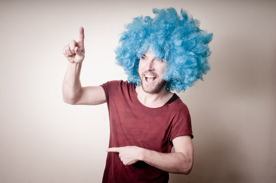 hipster stylish funny man with blue wig