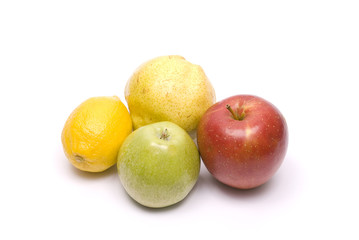 Lemon, Pear, Green and Red apple on white