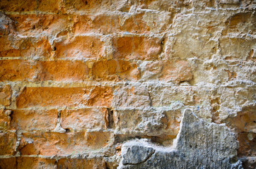 Background texture of an old wall of clay bricks