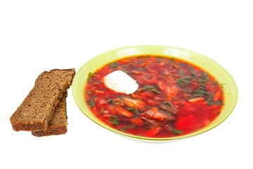 rye bread and a plate with borsch