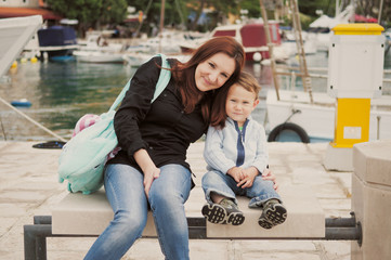 Mother and son in harbor