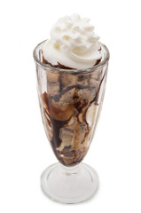 A delicious chocolate ice cream sundae isolated on white