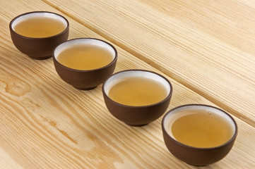 Chinese traditional teacups with green tea