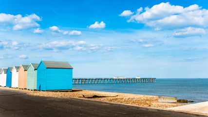 Bright Beach Huts at Felixstowe, Suffolk, England, UK