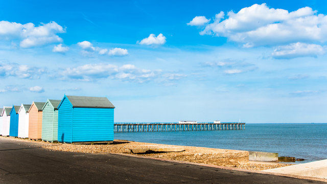 Bright Beach Huts at Felixstowe, Suffolk, England, UK