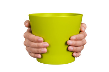 hands holding plant pot