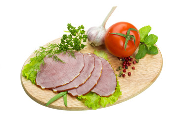 Ripe fresh ham with vegetables