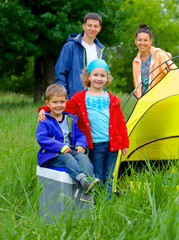 Summer child camping in tent