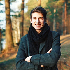 Young smiling man outdoor portrait