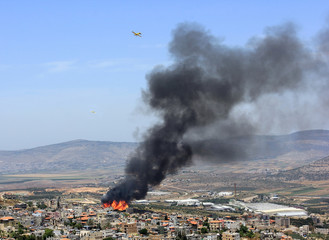 fire in the palestinian village of Mashhad near Nazareth