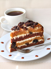 Cake with sour cream, prunes and walnuts