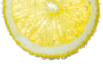 Lemon Slice in Clear Fizzy Water Bubble Background