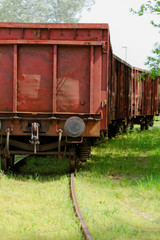 Fototapeta na wymiar Old wagon, in an unused railway track