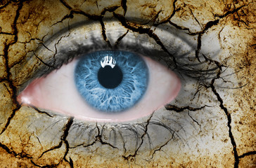 Fototapeta premium Cracked earth on human face