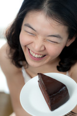 Happy Woman with chocolate cake