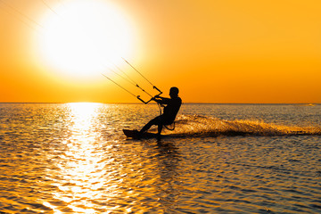 Silhouette of a kitesurfer