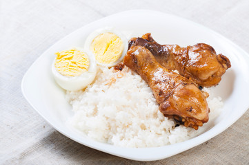 chicken braised in soy sauce, vinegar pepper and bay leaves