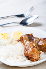 chicken braised in soy sauce, vinegar pepper and bay leaves