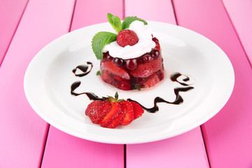 Tasty jelly dessert with fresh berries,