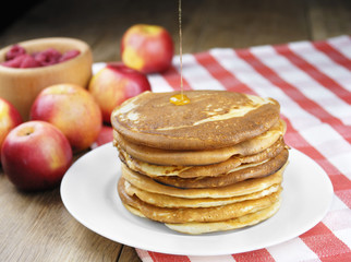 Pile of pancakes in the white plate